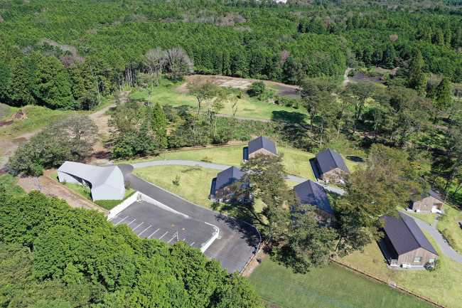 The hotel nestled at the foot of the hill which runs toward Mount Fuji