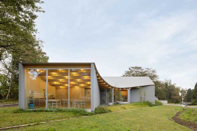 The hotel nestled at the foot of the hill which runs toward Mount Fuji
