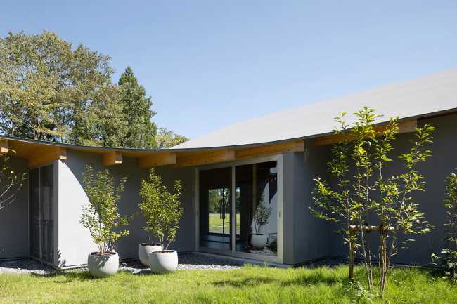 The hotel nestled at the foot of the hill which runs toward Mount Fuji