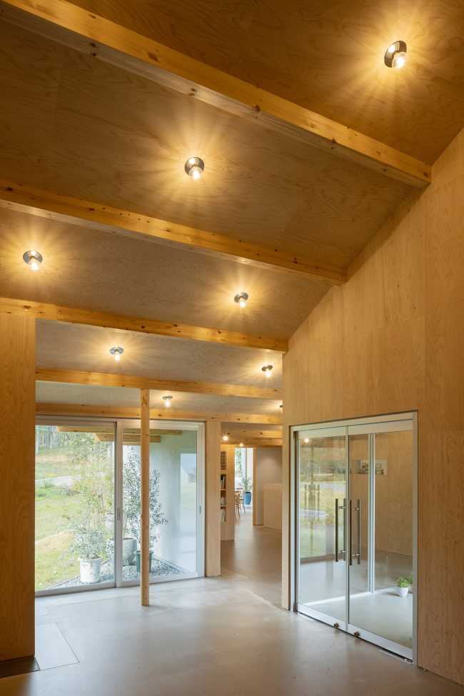 The hotel nestled at the foot of the hill which runs toward Mount Fuji