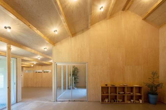 The hotel nestled at the foot of the hill which runs toward Mount Fuji