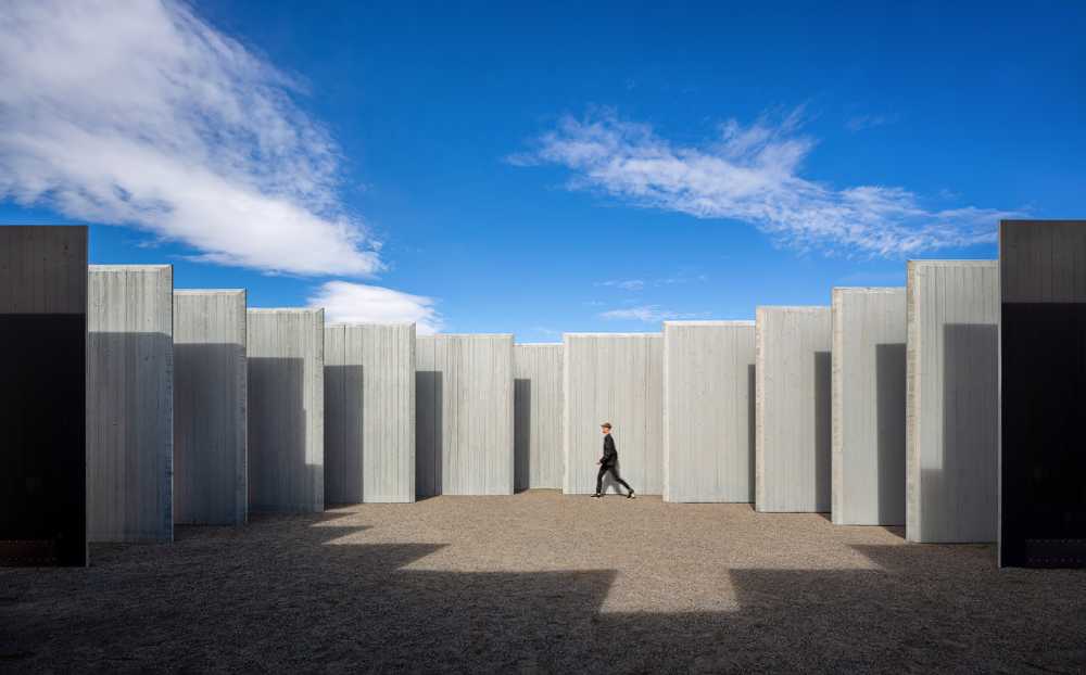 From the simplicity of the form to the depth of the art: Town Enclosure, a laminated wood installation