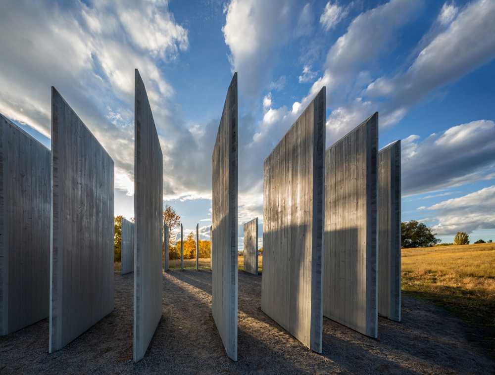 From the simplicity of the form to the depth of the art: Town Enclosure, a laminated wood installation