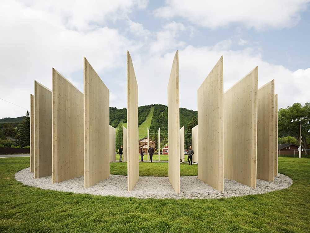 From the simplicity of the form to the depth of the art: Town Enclosure, a laminated wood installation