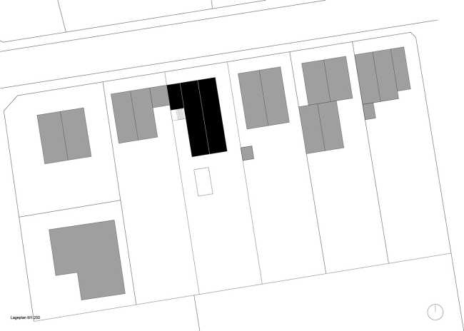 House W1T in legno e cemento per un abitare sostenibile e un’architettura dai volumi dinamici
