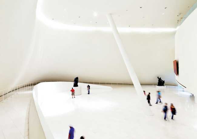 The iconic Soumaya Museum and its shiny steel tile facade.