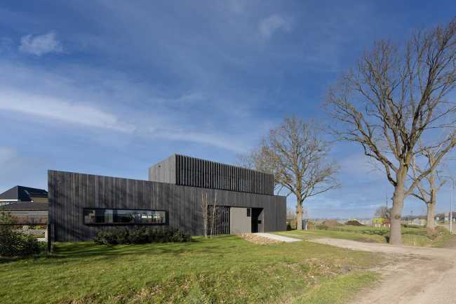 Burnt wood and an energetic neutrality in the silky Dutch Black House