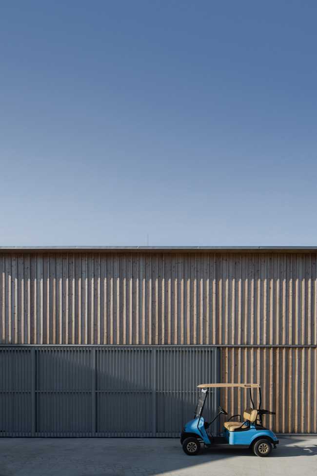 Challenging architecture with three buildings and a courtyard at the Golf & Ski Resort in Ostravice: maintenance properties transformed through wood design