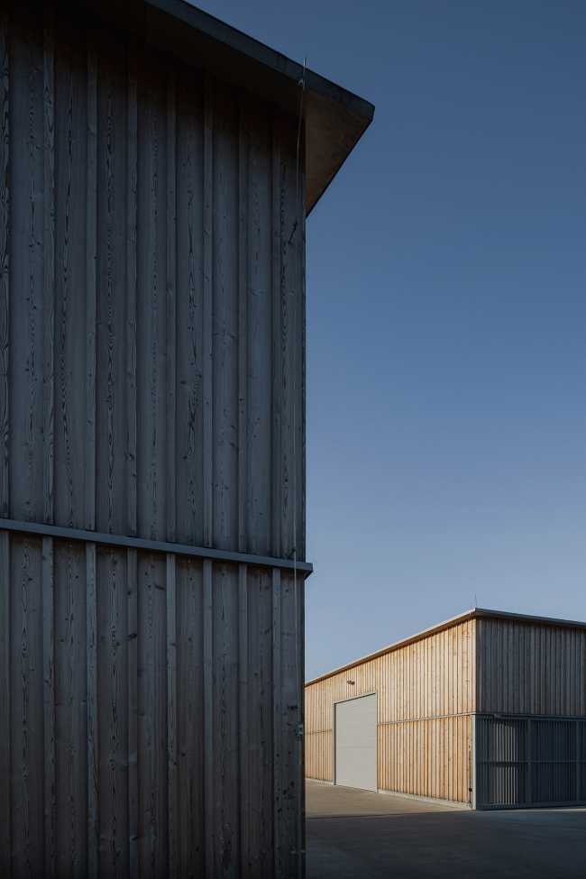 Challenging architecture with three buildings and a courtyard at the Golf & Ski Resort in Ostravice: maintenance properties transformed through wood design