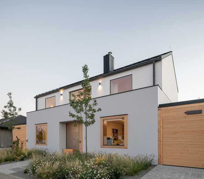 Casa familiar con jardín, el espacio exterior como extensión de la casa