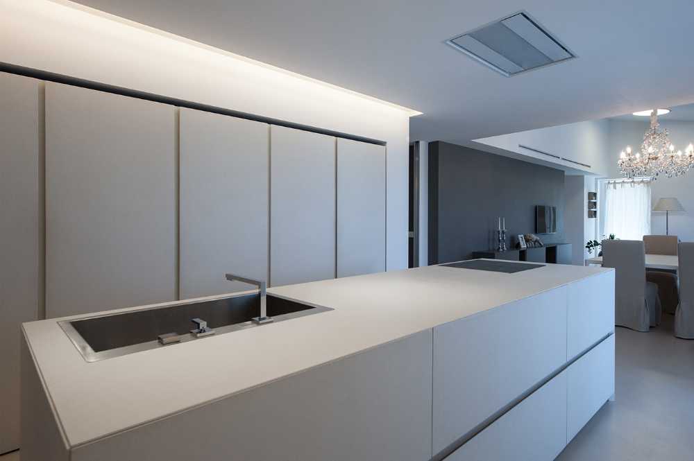 Minimalist penthouse. Architecture and furniture blend together using similar materials