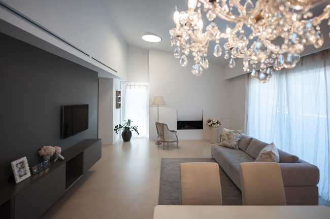 Minimalist penthouse. Architecture and furniture blend together using similar materials