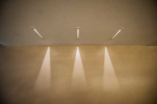 Minimalist penthouse. Architecture and furniture blend together using similar materials