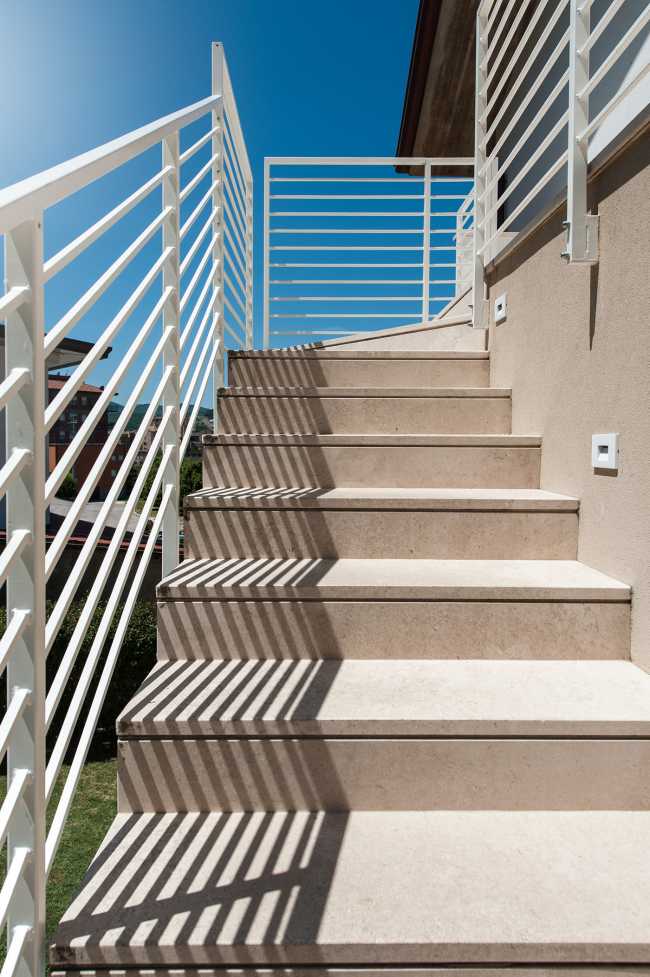 Minimalist penthouse. Architecture and furniture blend together using similar materials