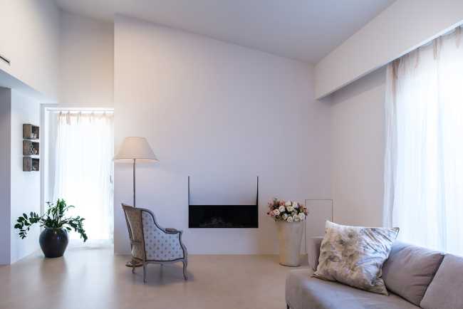 Minimalist penthouse. Architecture and furniture blend together using similar materials