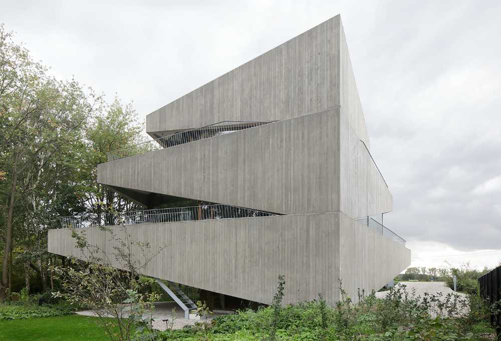 A playful facade of asymmetrical canopies for the N-DP House