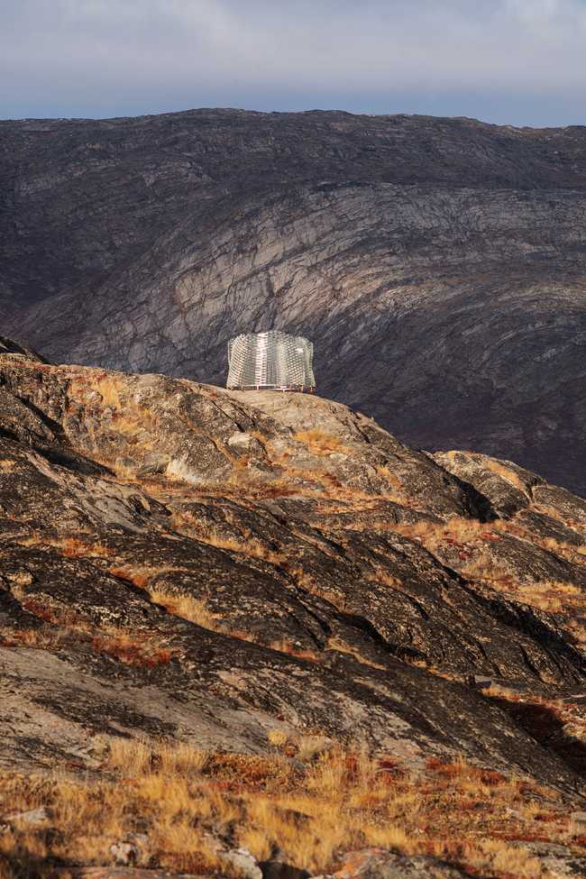 A glazed brick casket that is inspired by the reflections of the moon on the snow