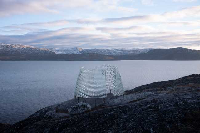 A glazed brick casket that is inspired by the reflections of the moon on the snow