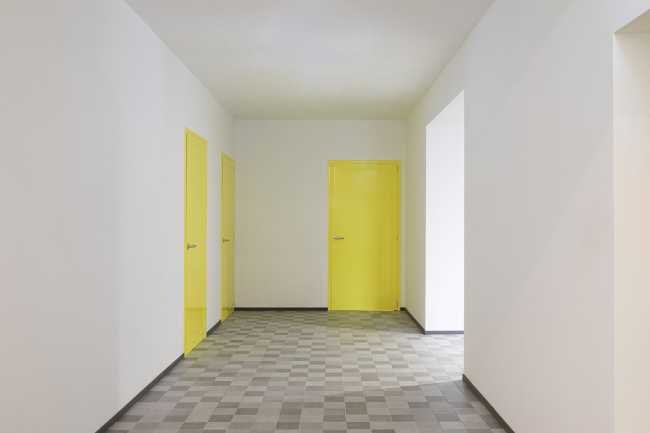 Renovation of School gym Zanella in Villafranca: color, light and high-performance materials