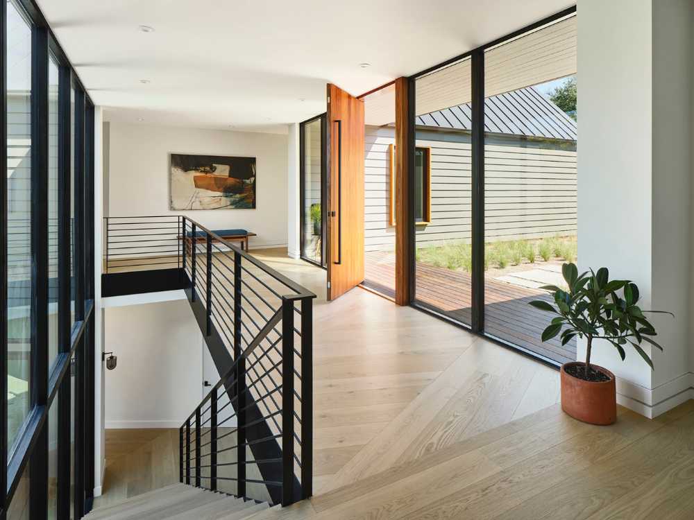 Flowing spaces and artistic details for The Hartford Residence in Texas