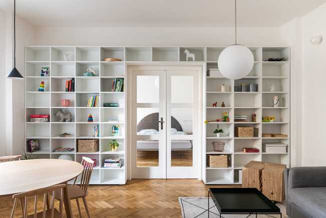 The renovation of the Apartment H in Bratislava's Old Town. A rational layout and a contrast between the white and the primary colors