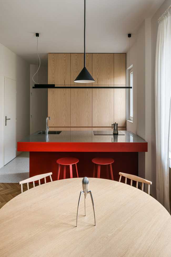 The renovation of the Apartment H in Bratislava's Old Town. A rational layout and a contrast between the white and the primary colors