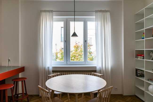 The renovation of the Apartment H in Bratislava's Old Town. A rational layout and a contrast between the white and the primary colors