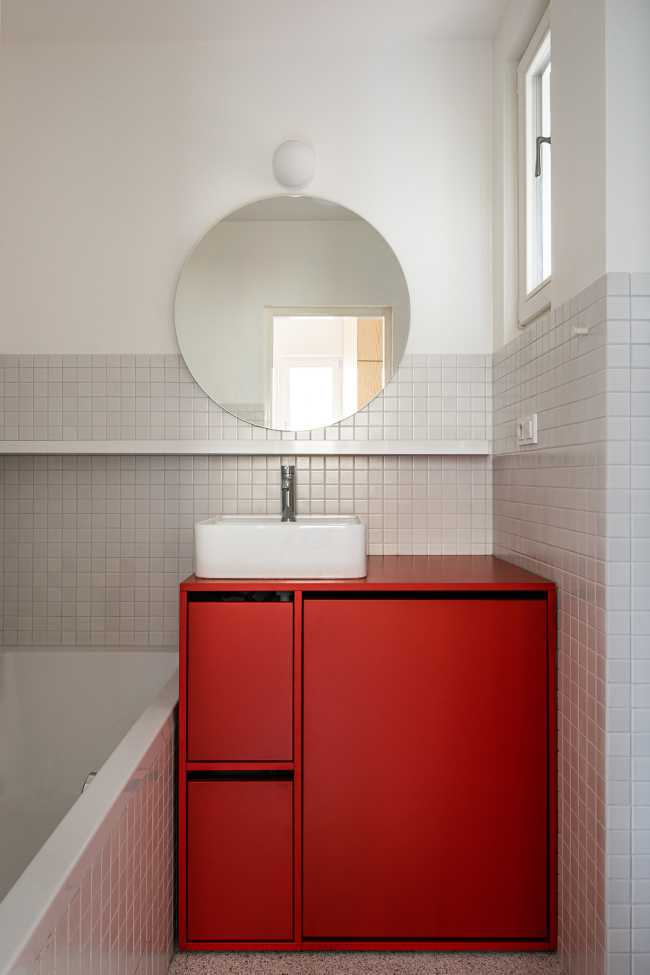 The renovation of the Apartment H in Bratislava's Old Town. A rational layout and a contrast between the white and the primary colors