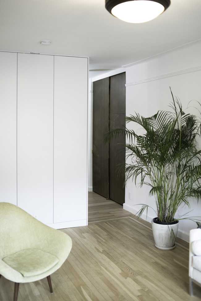 Rénovation intérieure d'un appartement à New York. Récupération des éléments d'origine des années 30 et nouvelle conception de l'espace.