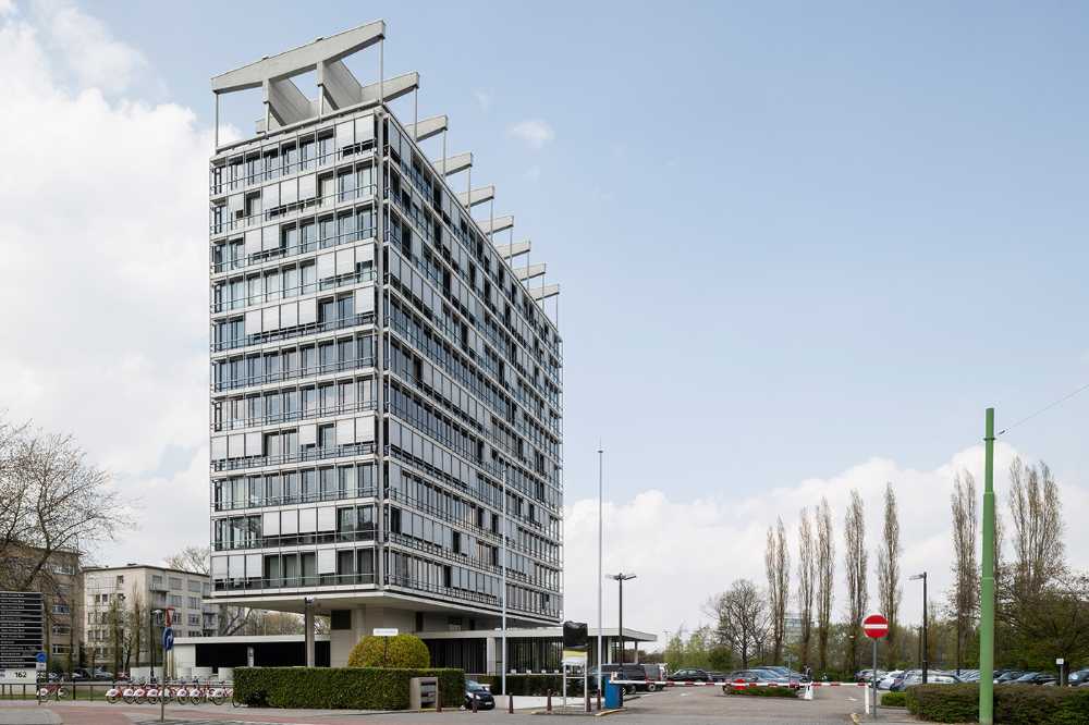 Buysse & Partners' new headquarters and the Domesticity of Office Space in an iconic building of the Belgian modern architecture