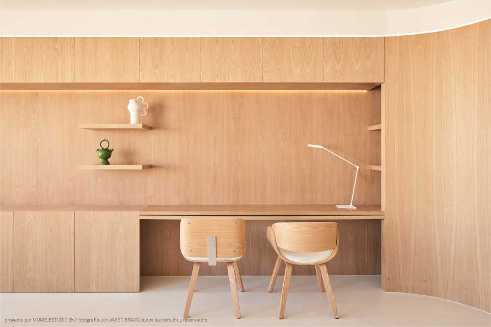 EMB Apartment. Two architectural elements would solve the design of the entire living space