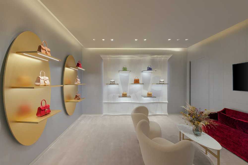 A new Delvaux boutique in the Dubai Mall. The iconic leather goods land in the Middle East with an unprecedented aesthetic of elegance