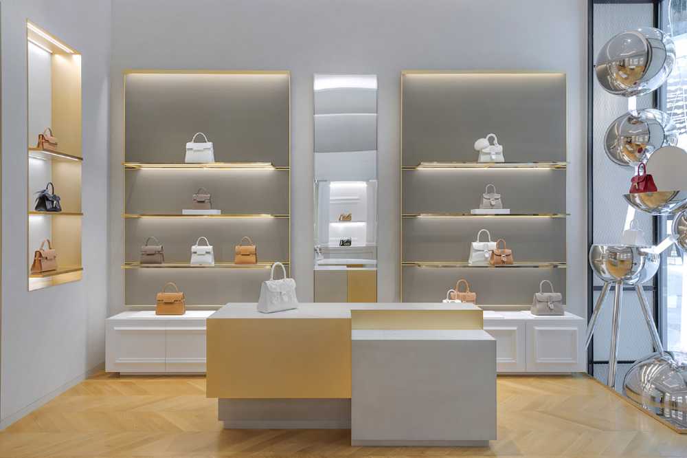 A new Delvaux boutique in the Dubai Mall. The iconic leather goods land in the Middle East with an unprecedented aesthetic of elegance
