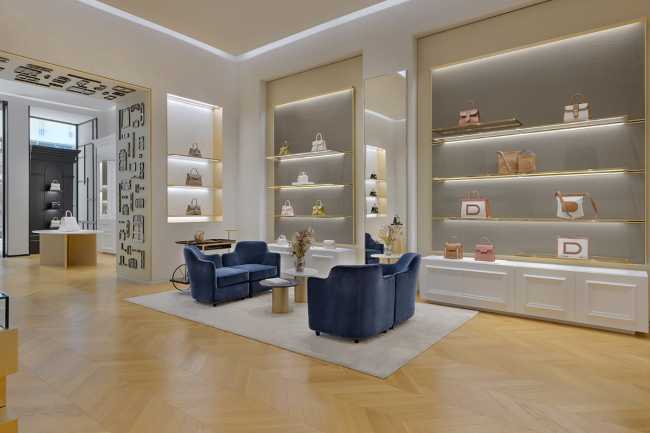 A new Delvaux boutique in the Dubai Mall. The iconic leather goods land in the Middle East with an unprecedented aesthetic of elegance