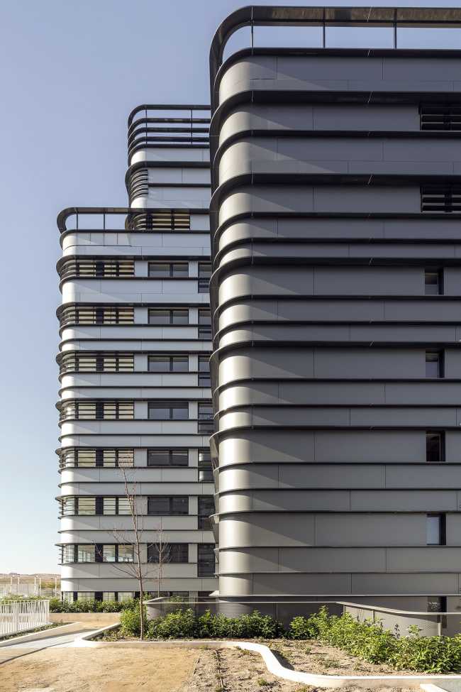 Three towers for housing and stores in Madrid. Panoramic views, social interaction and integration with nature are the highlights of the project