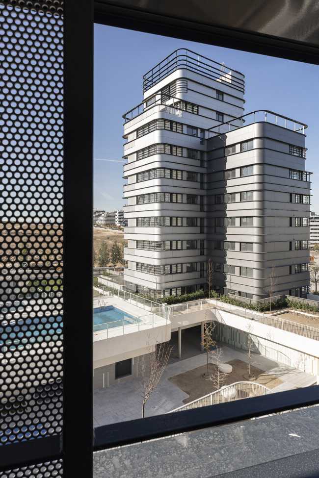 Three towers for housing and stores in Madrid. Panoramic views, social interaction and integration with nature are the highlights of the project