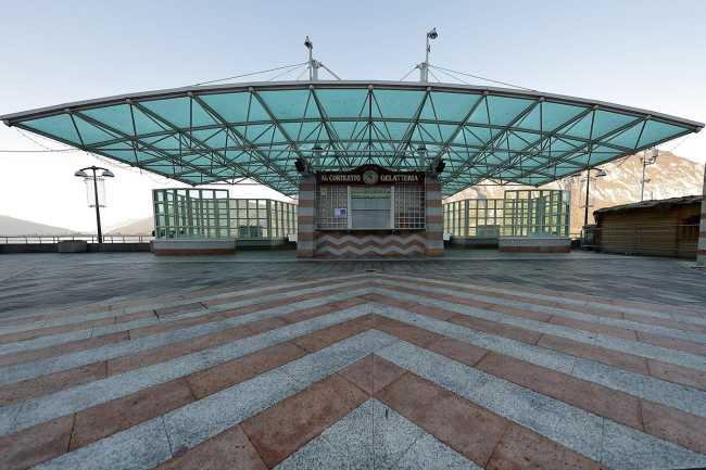 Imbarcadero and Lakefront of Campione. Ode to tradition through public space design