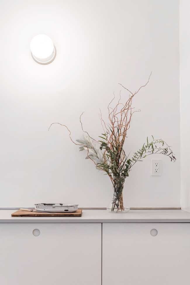 Can a strict and understated design evoke a sense of whimsical wonder and discovery?