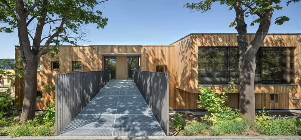 The Kita II Preschool. Three volumes in solid wood