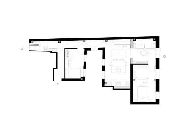 Pared de espejos para captar la luz y materiales que adquieren más encanto con el paso del tiempo. Renovación de la casa FROD