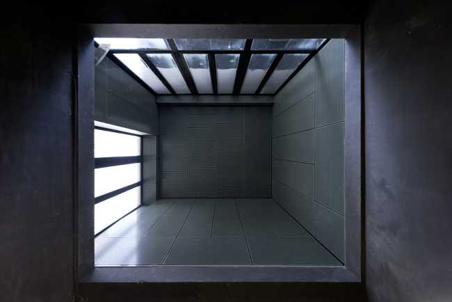 Zegel a mixed-function building with an exuberant structure toned down by the lightweight aluminum façade shell