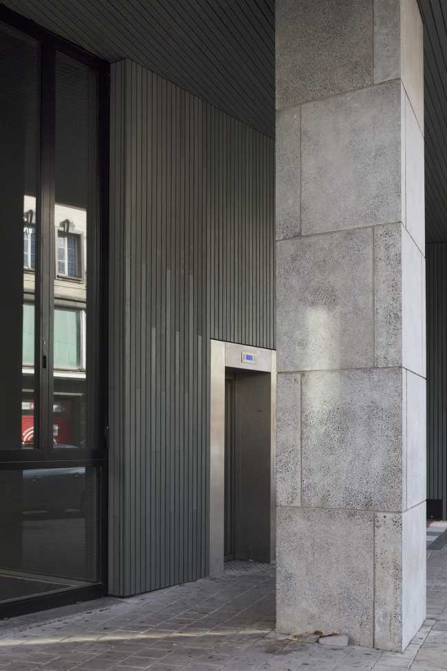 Zegel a mixed-function building with an exuberant structure toned down by the lightweight aluminum façade shell