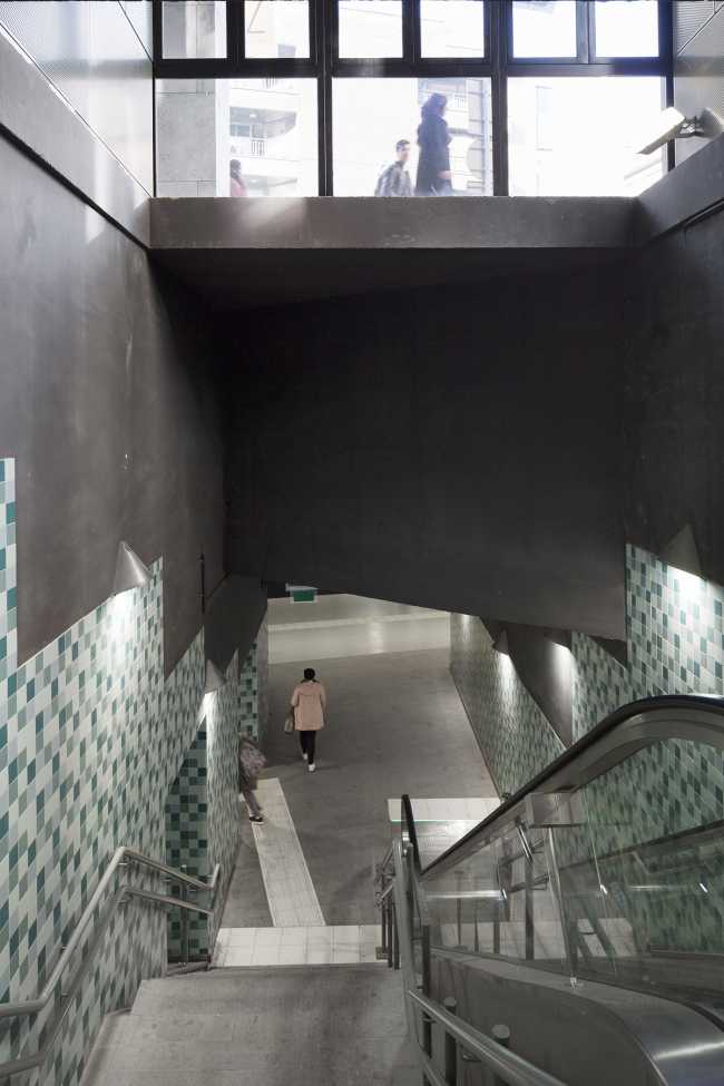 Zegel a mixed-function building with an exuberant structure toned down by the lightweight aluminum façade shell