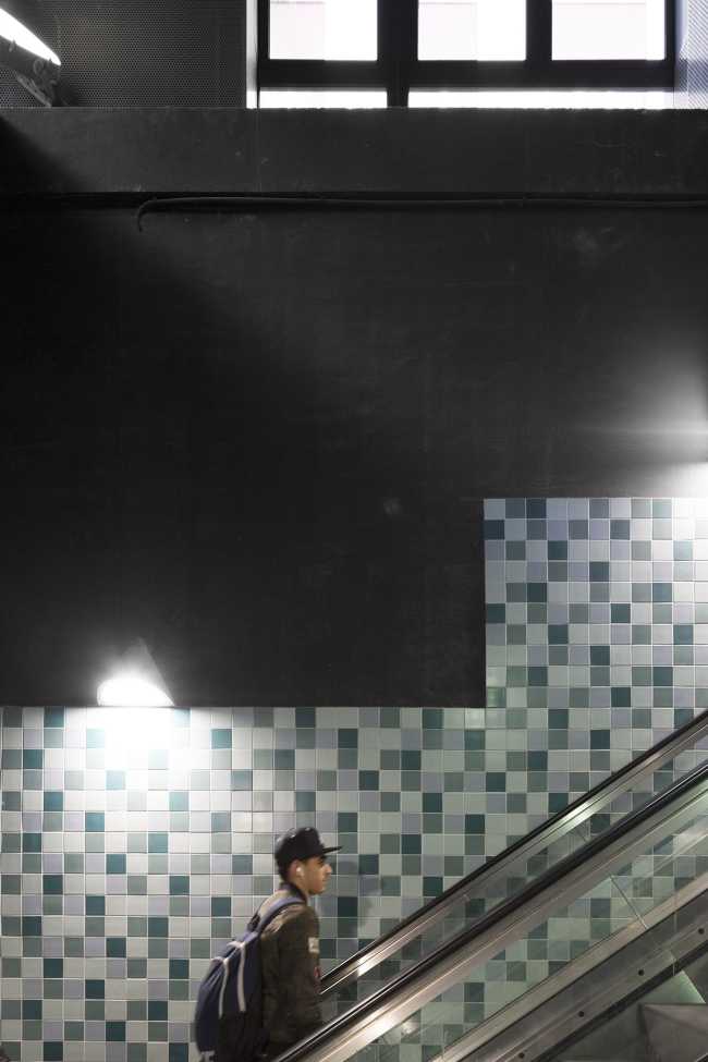 Zegel a mixed-function building with an exuberant structure toned down by the lightweight aluminum façade shell