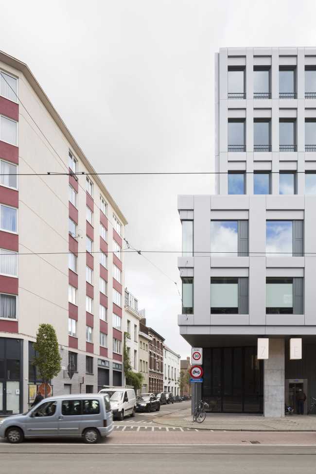 Zegel a mixed-function building with an exuberant structure toned down by the lightweight aluminum façade shell