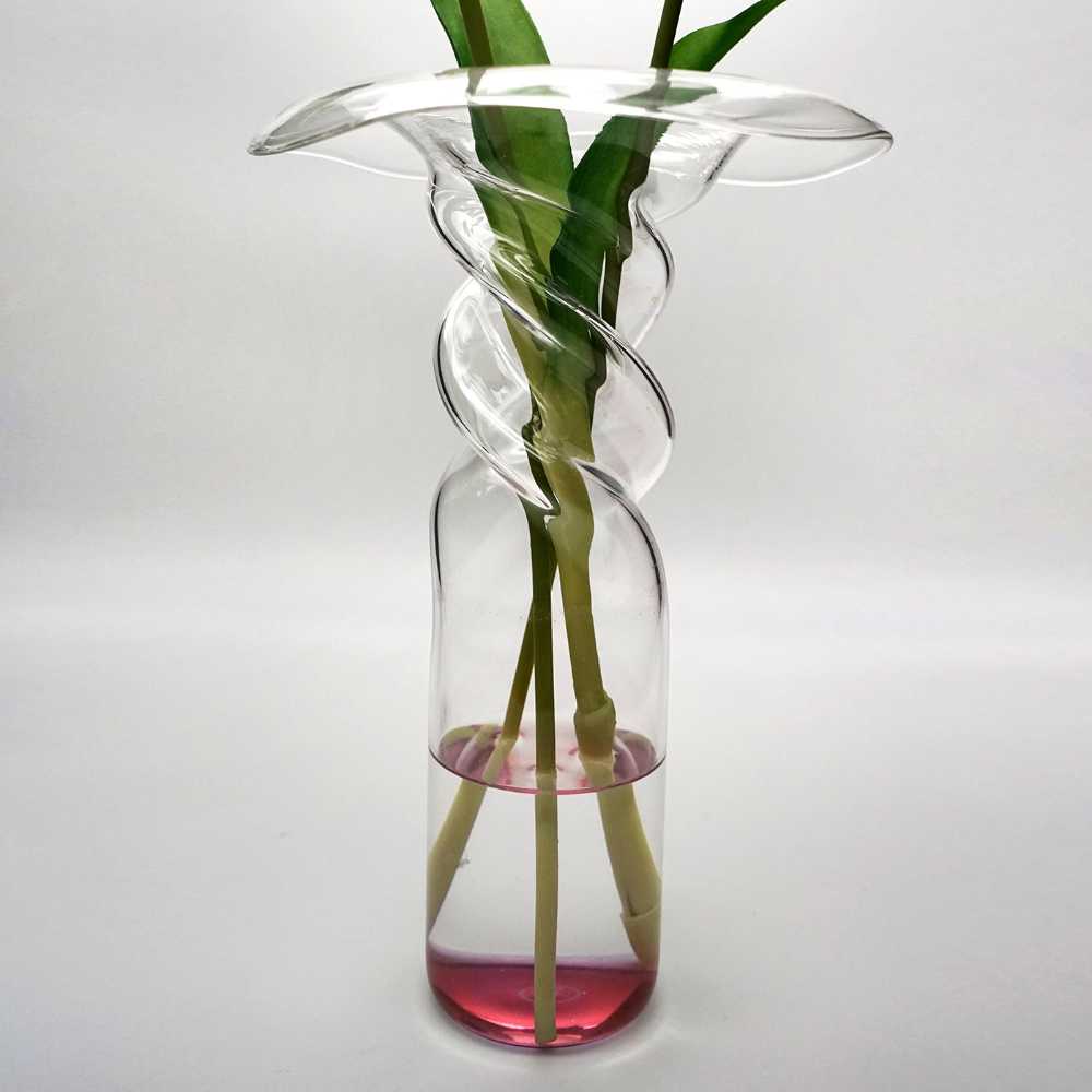 Poppy Vase is an organic inspired design. An imaginary flower for a delicate accent in the home