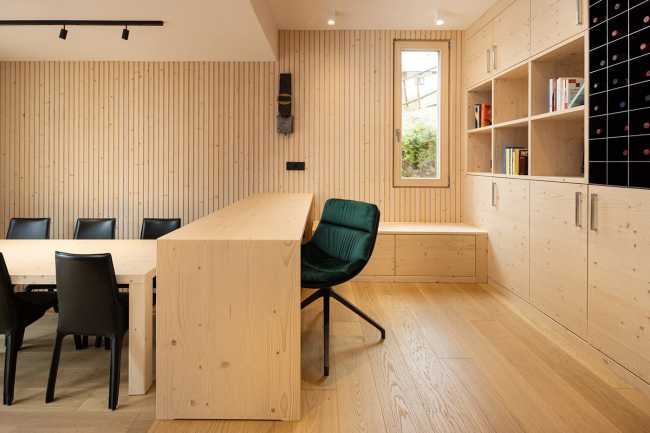 The restyling of WRC House. An elegant style revamped with bold material touches