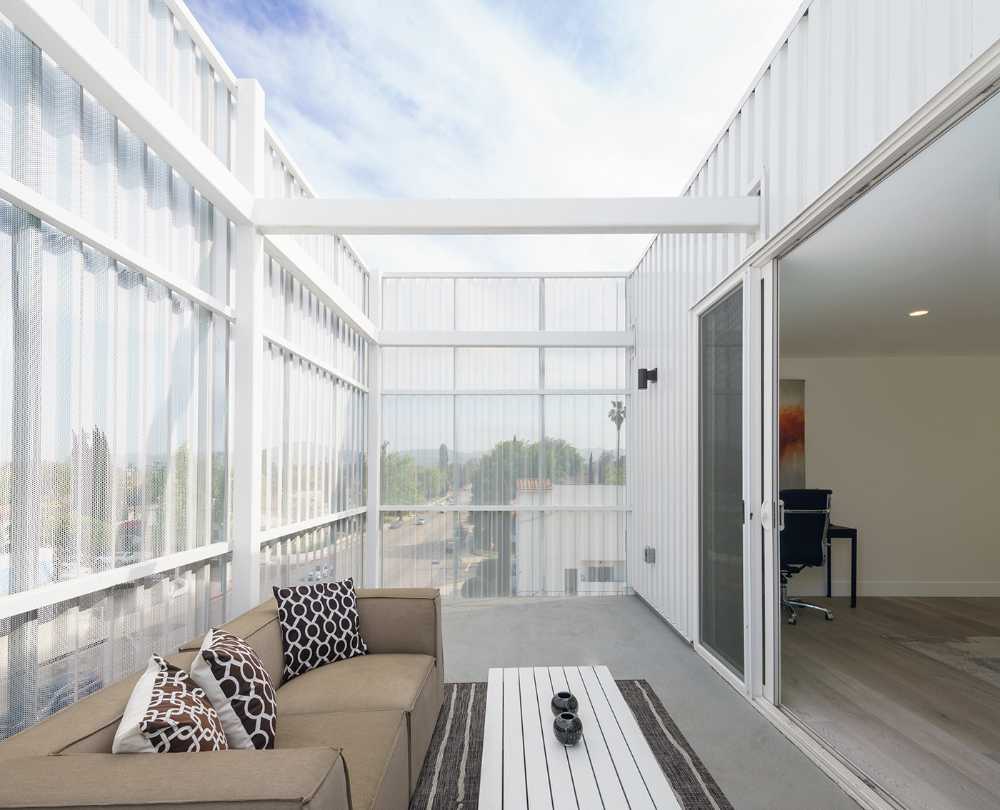 El típico patio americano reinterpretado en el proyecto arquitectónico de Magnolia Hill.