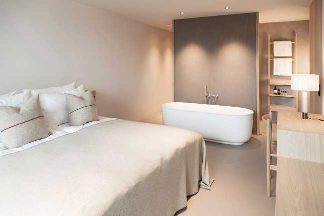 La trasparenza di un affascinante boutique hotel attira ospiti e visitatori