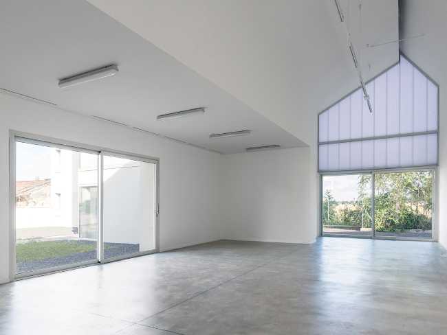 Dialéctica entre arquitectura y paisaje. Residencia de ancianos y Salón Público en el campo lombardo